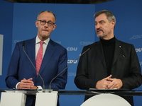 Friedrich Merz, CDU Federal Chairman and CDU/CSU Parliamentary Group Leader, and Markus Soder, the Prime Minister of Bavaria (CSU), speak to...