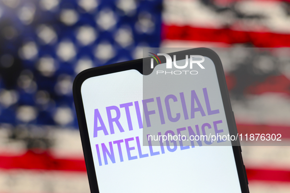 The text 'Artificial Intelligence (AI)' appears on a smartphone screen in this illustration photo, with the United States flag in the backgr...