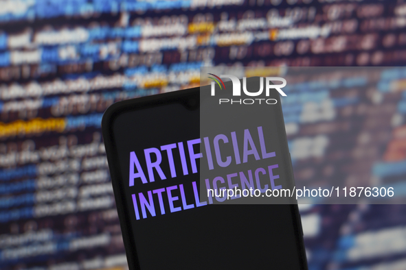 The text ''Artificial Intelligence (AI)'' appears on a smartphone screen in this illustration photo in Reno, United States, on December 17,...