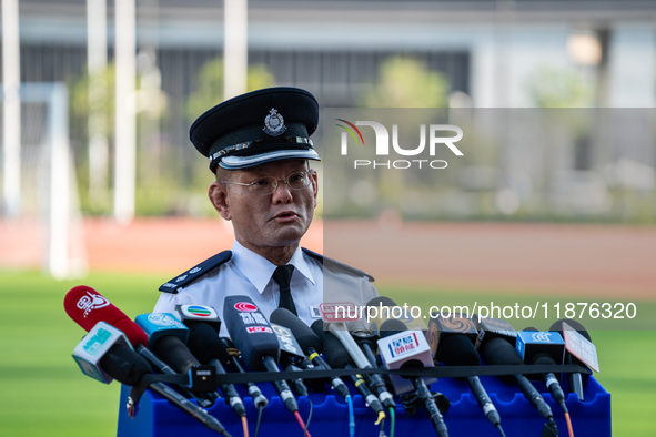 Inter-department Counter Terrorism Unit Senior Superintendent, Leung Wai Kei, speaks to the media at Kai Tak Sports Park in Hong Kong on Dec...