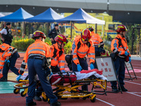 Paramedics participate in a counter-terrorism exercise at Kai Tak Sports Park in Hong Kong on December 17, 2024. (