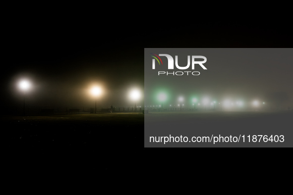 Dense fog covers Liberty State Park following rainfall in Jersey City, NJ, U.S., on December 16, 2024. 