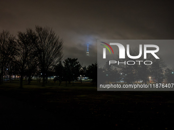 Part of the New York City skyline is seen through dense fog covering Liberty State Park following rainfall in Jersey City, NJ, U.S., on Dece...