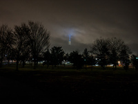 Part of the New York City skyline is seen through dense fog covering Liberty State Park following rainfall in Jersey City, NJ, U.S., on Dece...