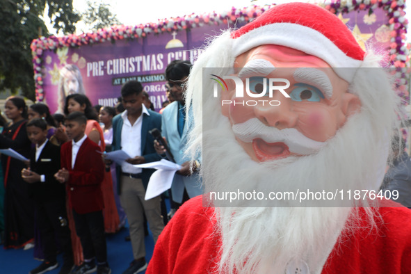 A Protestant Christian man dressed as Santa Claus attends a pre-Christmas celebration in Kolkata, India, on December 17, 2024. Protestantism...