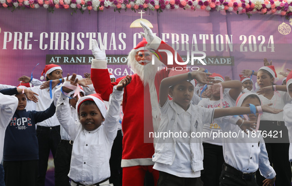 Protestant Christian children perform during a pre-Christmas celebration in Kolkata, India, on December 17, 2024. Protestantism is a branch...