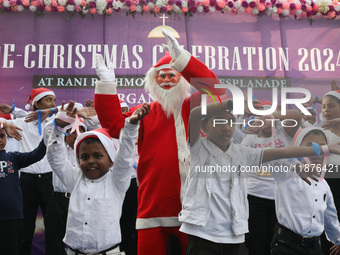 Protestant Christian children perform during a pre-Christmas celebration in Kolkata, India, on December 17, 2024. Protestantism is a branch...