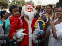 A Protestant Christian man dressed as Santa Claus attends a pre-Christmas celebration in Kolkata, India, on December 17, 2024. Protestantism...