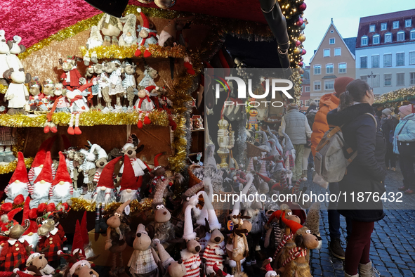 People are outside on the streets in Augsburg, Bavaria, Germany, on December 14, 2024, looking for gifts and presents. 