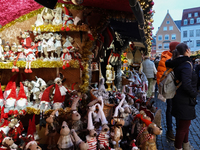 People are outside on the streets in Augsburg, Bavaria, Germany, on December 14, 2024, looking for gifts and presents. (