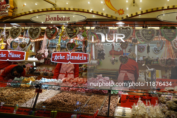 People are outside on the streets in Augsburg, Bavaria, Germany, on December 14, 2024, looking for gifts and presents. 