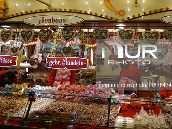 People are outside on the streets in Augsburg, Bavaria, Germany, on December 14, 2024, looking for gifts and presents. (