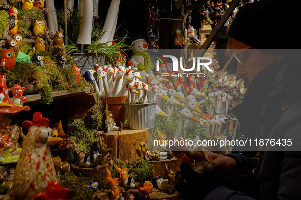 People are outside on the streets in Augsburg, Bavaria, Germany, on December 14, 2024, looking for gifts and presents. 