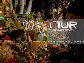 People are outside on the streets in Augsburg, Bavaria, Germany, on December 14, 2024, looking for gifts and presents. (