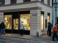 People are outside on the streets in Augsburg, Bavaria, Germany, on December 14, 2024, looking for gifts and presents. (