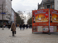 A promotional display announces the dates of the Augsburg Christkindlesmarkt, one of Germany's Christmas markets, on December 14, 2024. A wo...