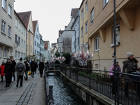 People are outside on the streets in Augsburg, Bavaria, Germany, on December 14, 2024, looking for gifts and presents. (