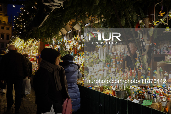 People are outside on the streets in Augsburg, Bavaria, Germany, on December 14, 2024, looking for gifts and presents. 