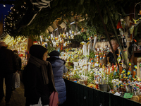 People are outside on the streets in Augsburg, Bavaria, Germany, on December 14, 2024, looking for gifts and presents. (