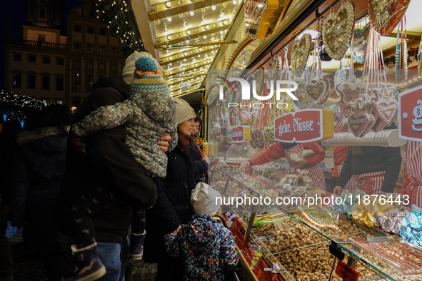 People are outside on the streets in Augsburg, Bavaria, Germany, on December 14, 2024, looking for gifts and presents. 