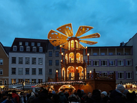 People are outside on the streets in Augsburg, Bavaria, Germany, on December 14, 2024, looking for gifts and presents. (