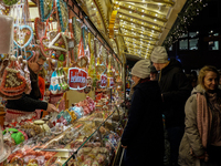 People are outside on the streets in Augsburg, Bavaria, Germany, on December 14, 2024, looking for gifts and presents. (