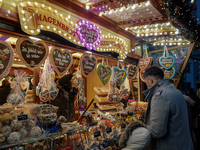 People are outside on the streets in Augsburg, Bavaria, Germany, on December 14, 2024, looking for gifts and presents. (