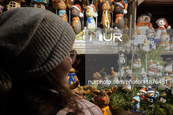 People are outside on the streets in Augsburg, Bavaria, Germany, on December 14, 2024, looking for gifts and presents. 