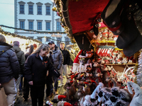 People are outside on the streets in Augsburg, Bavaria, Germany, on December 14, 2024, looking for gifts and presents. (