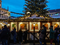 People are outside on the streets in Augsburg, Bavaria, Germany, on December 14, 2024, looking for gifts and presents. (