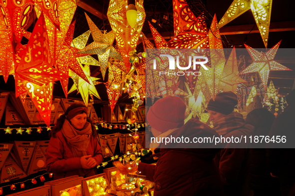 People are outside on the streets in Augsburg, Bavaria, Germany, on December 14, 2024, looking for gifts and presents. 