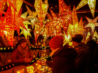 People are outside on the streets in Augsburg, Bavaria, Germany, on December 14, 2024, looking for gifts and presents. (