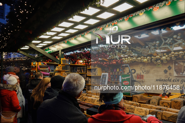 People are outside on the streets in Augsburg, Bavaria, Germany, on December 14, 2024, looking for gifts and presents. 