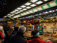 People are outside on the streets in Augsburg, Bavaria, Germany, on December 14, 2024, looking for gifts and presents. (