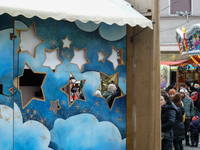 People are outside on the streets in Augsburg, Bavaria, Germany, on December 14, 2024, looking for gifts and presents. (