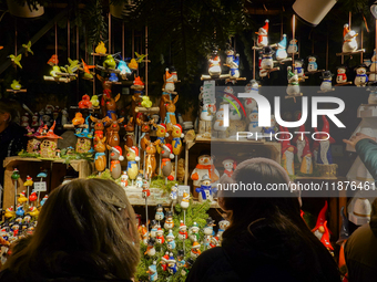 People are outside on the streets in Augsburg, Bavaria, Germany, on December 14, 2024, looking for gifts and presents. (