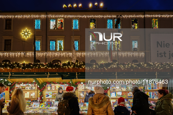 People are outside on the streets in Augsburg, Bavaria, Germany, on December 14, 2024, looking for gifts and presents. 