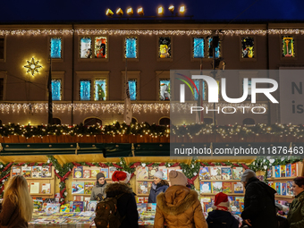 People are outside on the streets in Augsburg, Bavaria, Germany, on December 14, 2024, looking for gifts and presents. (