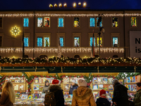 People are outside on the streets in Augsburg, Bavaria, Germany, on December 14, 2024, looking for gifts and presents. (