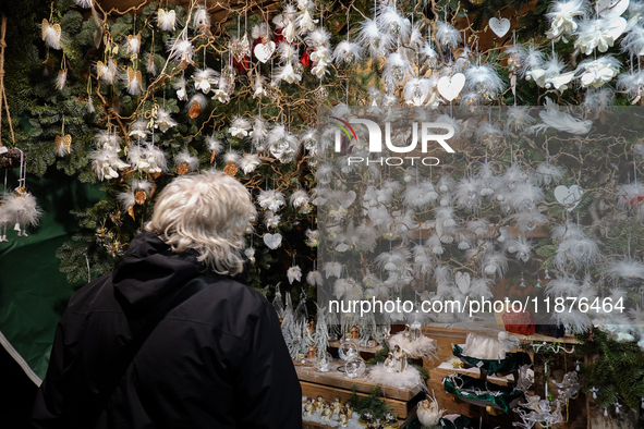 People are outside on the streets in Augsburg, Bavaria, Germany, on December 14, 2024, looking for gifts and presents. 