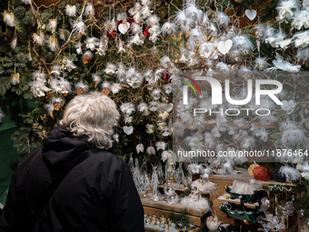 People are outside on the streets in Augsburg, Bavaria, Germany, on December 14, 2024, looking for gifts and presents. (