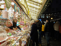 People are outside on the streets in Augsburg, Bavaria, Germany, on December 14, 2024, looking for gifts and presents. (