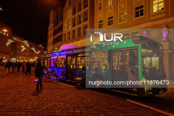 People are outside on the streets in Augsburg, Bavaria, Germany, on December 14, 2024, looking for gifts and presents. 