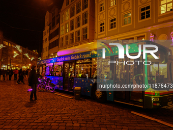 People are outside on the streets in Augsburg, Bavaria, Germany, on December 14, 2024, looking for gifts and presents. (