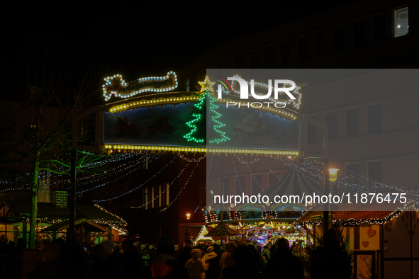 People are outside on the streets in Augsburg, Bavaria, Germany, on December 14, 2024, looking for gifts and presents. 