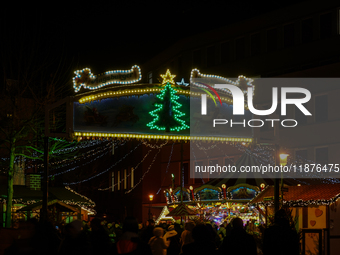 People are outside on the streets in Augsburg, Bavaria, Germany, on December 14, 2024, looking for gifts and presents. (