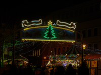 People are outside on the streets in Augsburg, Bavaria, Germany, on December 14, 2024, looking for gifts and presents. (