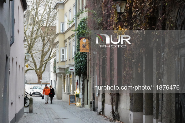 People are outside on the streets in Augsburg, Bavaria, Germany, on December 14, 2024, looking for gifts and presents. 