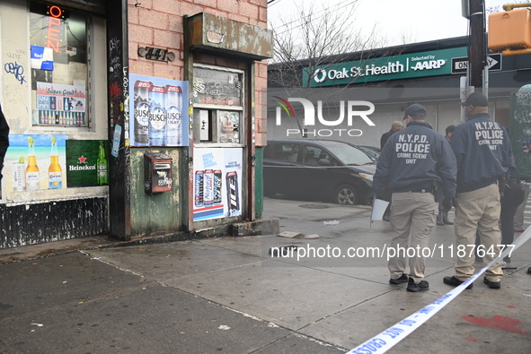 A man is stabbed multiple times to death outside of Mucho Luco Deli Grocery in Brownsville, Brooklyn, New York, United States, on December 1...