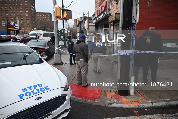 A man is stabbed multiple times to death outside of Mucho Luco Deli Grocery in Brownsville, Brooklyn, New York, United States, on December 1...